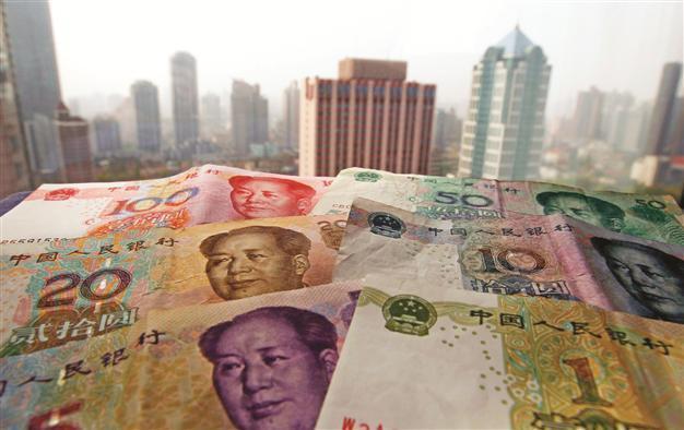 Monetary fund, US, welcome China move on wider yuan trading band
