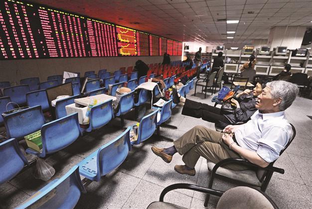 China raises limit on securities firms