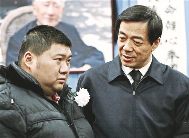 China purges top figure, arrests wife