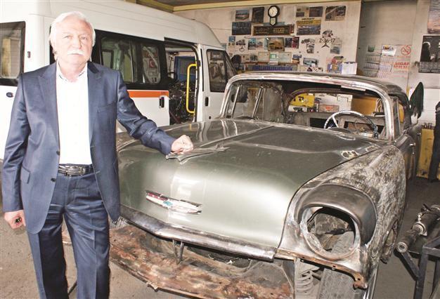 Businessman works to create 1956 Chevy