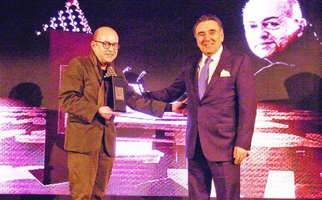 Award honors writer for his half-century of art