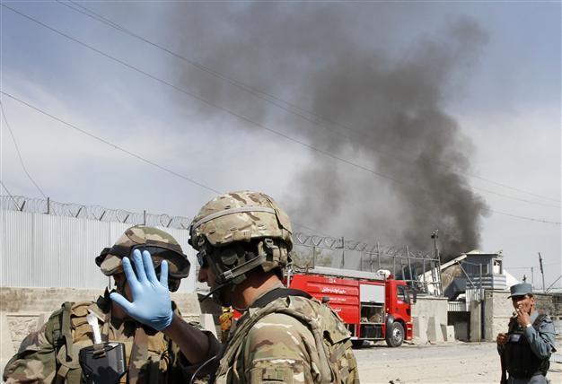 Seven killed as Taliban hit Kabul after Obamas end of war