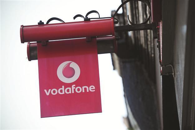 Vodafone cuts sales target on weak European market