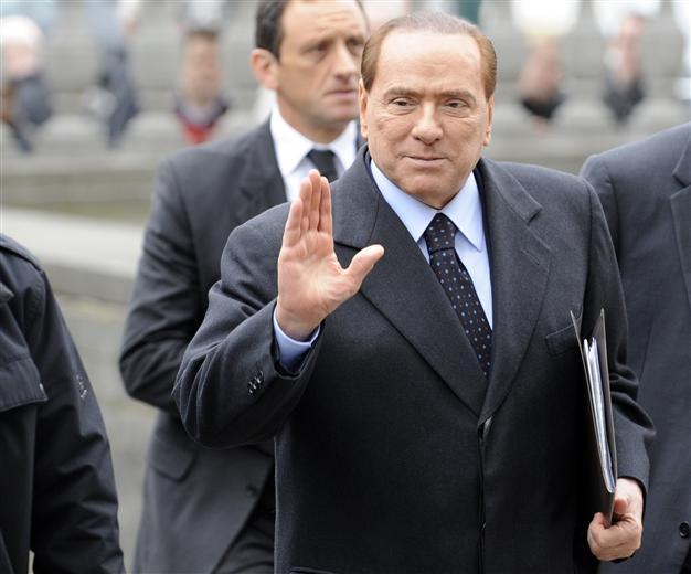 Berlusconi shows up for prostitution trial