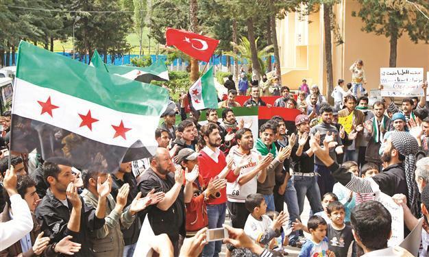 Syria shelling continues despite UN peace plan