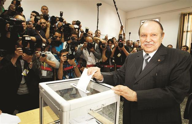 Algeria votes in first poll since uprisings