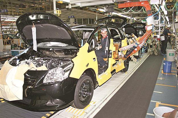 Toyota says performance, not religion, behind layoffs