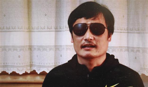 EU urges restraint in case of escaped China dissident