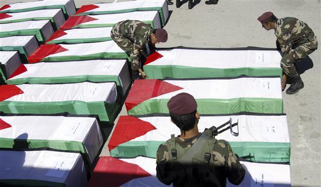 Israel hands over bodies of Palestinian militants