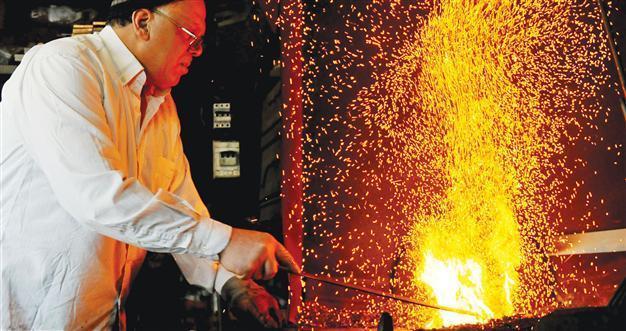 Iron masters keep their fires burning