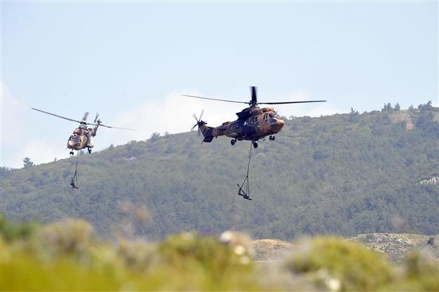 PKK militants burn construction vehicles as workers go missing