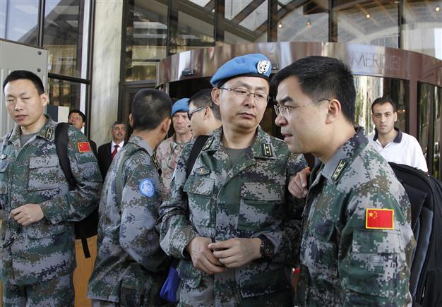 China calls for investigation into Syria massacre