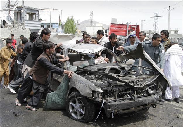 Twin Afghanistan suicide bombing kills 23: police