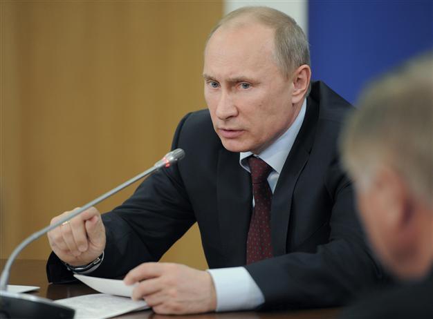 Russian protest leaders homes raided by police on rally eve