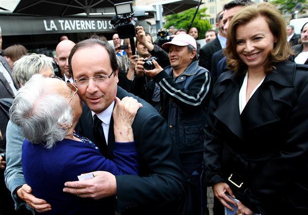 French president basks in leftists’ victory in elections