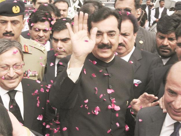Gilani bruised in power struggle by court blow
