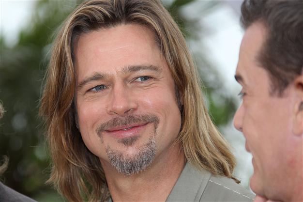 Pitt in Cannes as recession-hit contract killer