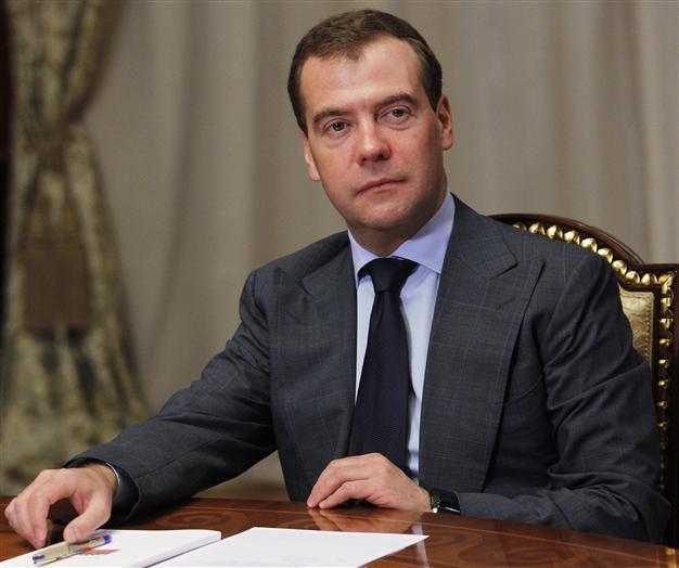 Medvedev promises freedoms as Putins premier