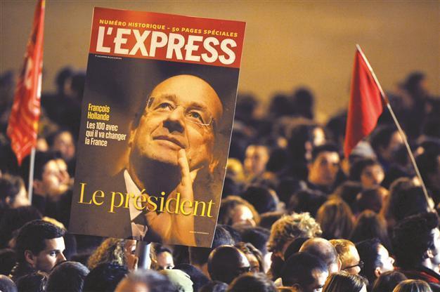 Belt-tightening critic Hollande wins in polls