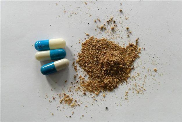 China to probe dead baby pills claims