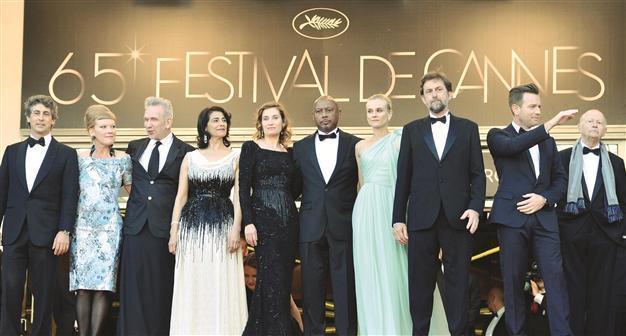Stars, sexism row share Cannes opening spotlight