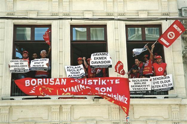 Workers occupy art center in wage protest