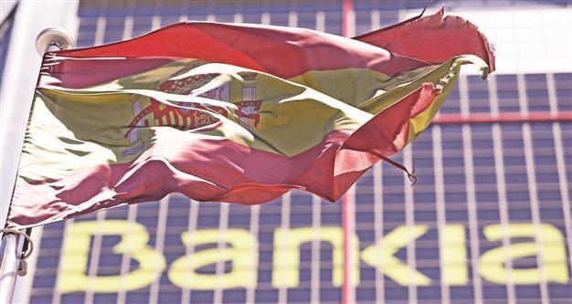 Spain says crisis stricken banks need up to 62 billion euros to survive slump