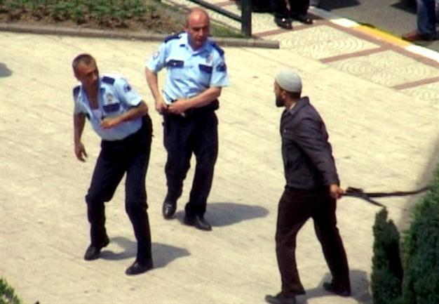 Protester draws sword on Turkish police