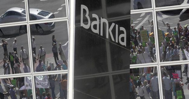 Spain formally requests banking aid