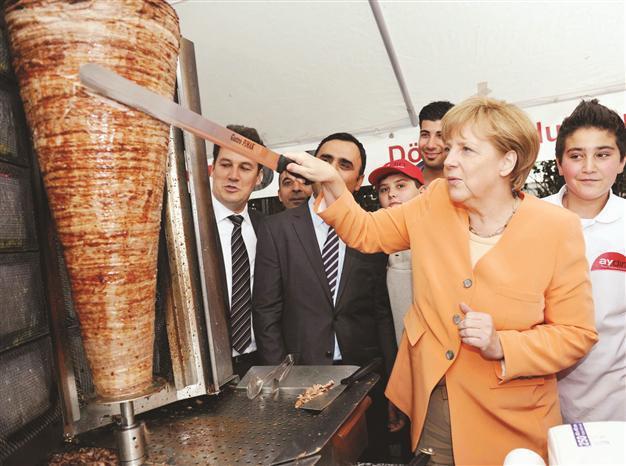 Merkel isolated but firm before crucial EU summit