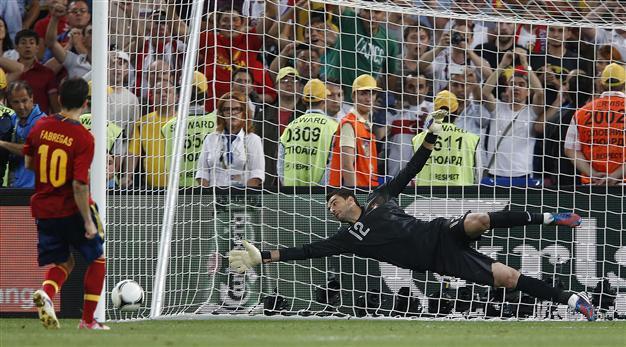 Fabregas penalty brings Spain full circle