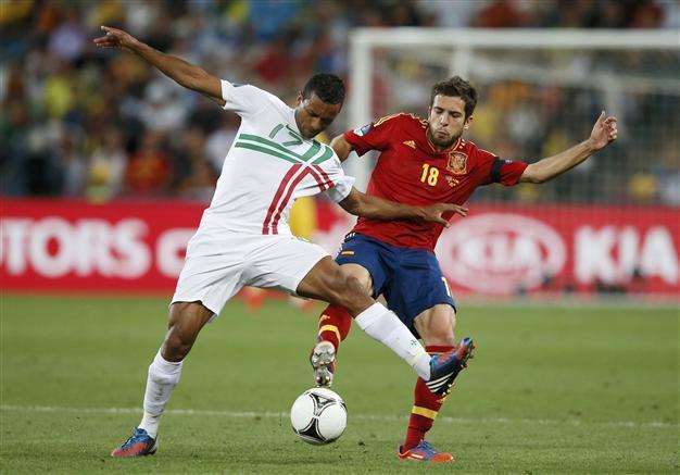 Football: Barca strikes deal to sign Valencias Alba
