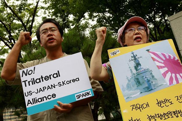 South Korea, Japan postpone landmark military pact