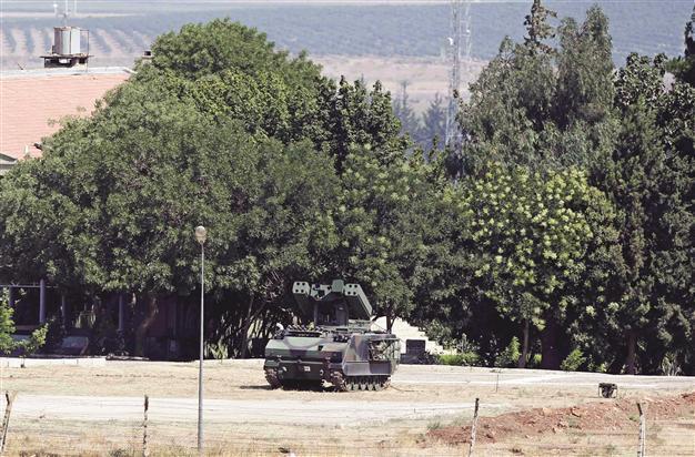 Turkey, Syria boost forces