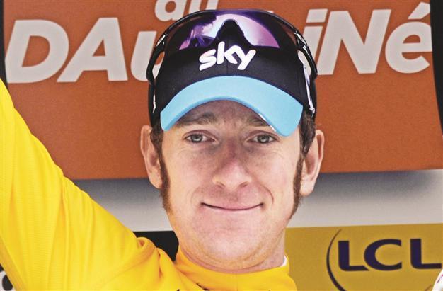 Britain’s Wiggins wins in the Alps