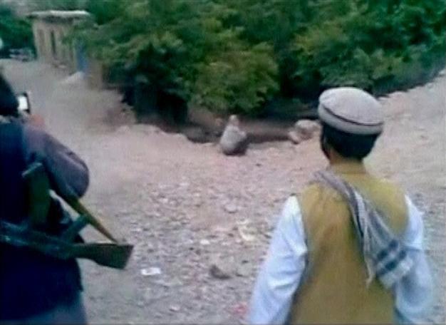 Afghan police hunt womans executioner