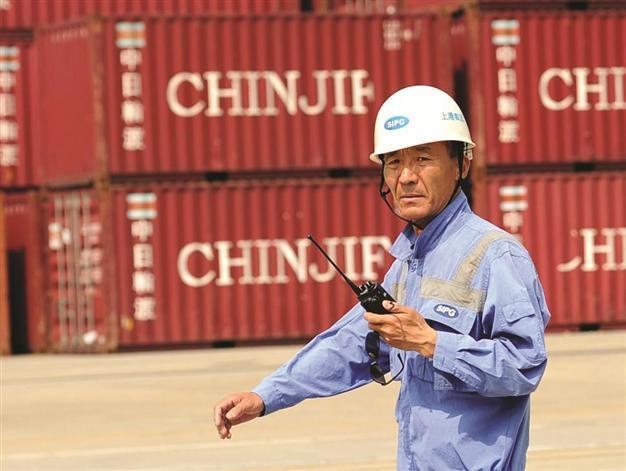 China’s trade surplus up as imports weaken