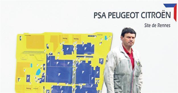 Peugeot slashes jobs, sparks union reaction