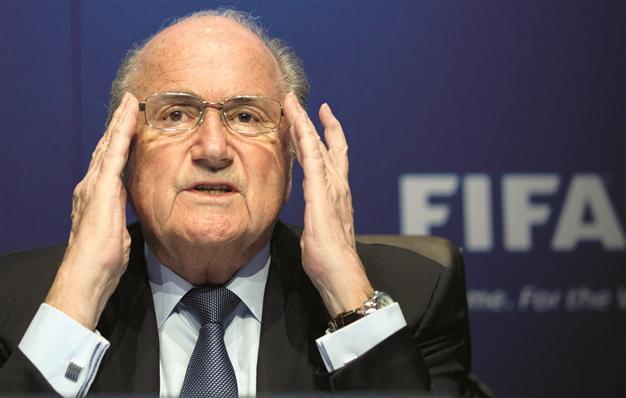 Blatter urged to explain bribe scandal