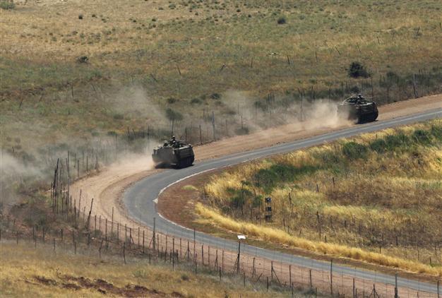 Syria rebels say chemical weapons moved to borders