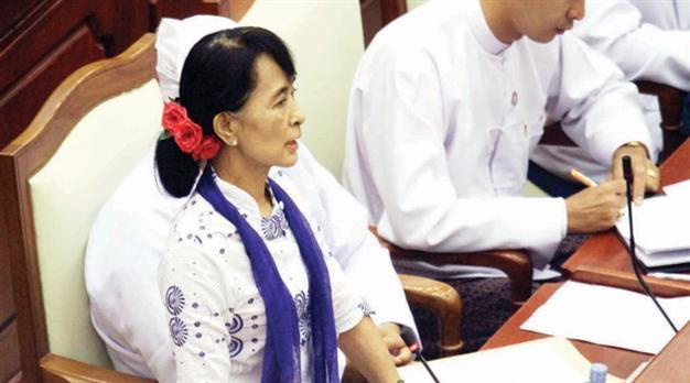 Suu Kyi urges protection for minorities