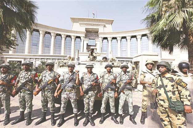 Egyptians vote for uncertain future under military control