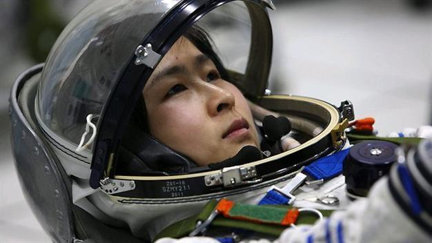 China sends first woman into space