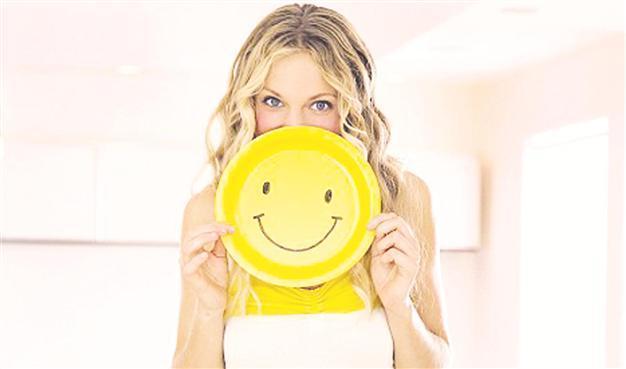 Cut down on stress by ‘grinning and bearing it’: Study