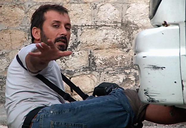 Photos illustrate shooting of Turkish reporter in Syria