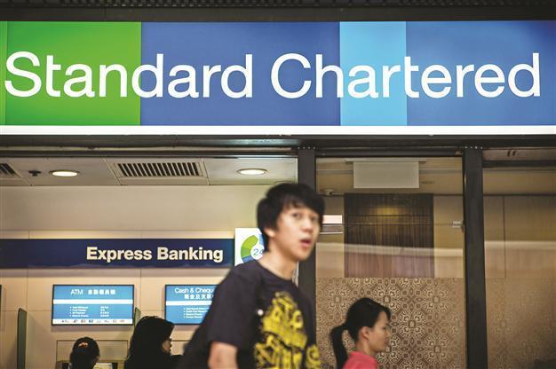 Standard Chartered posts record high 1st half profit