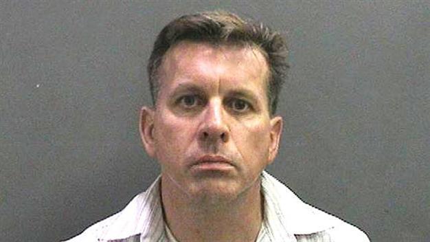 Professor arrested over US school shooting threat: report