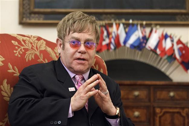 Elton John brands Madonna fairground stripper