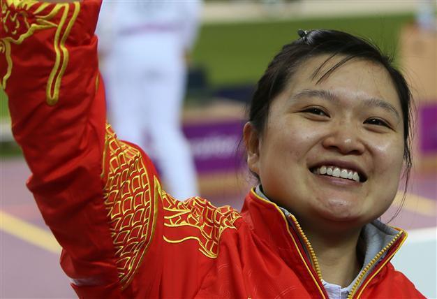 China’s Guo defends pistol title in nail-biter