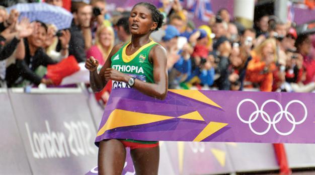 Gelana upsets Kenyans to win soggy marathon